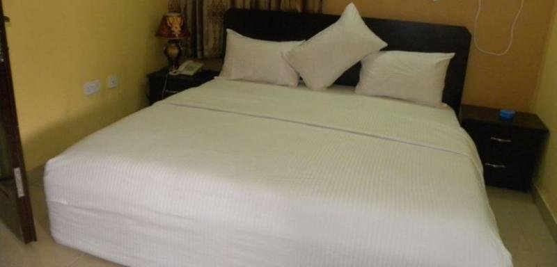 Фото Grandy Suites Hotel