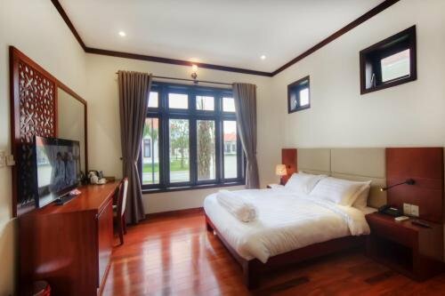 Гостиница Ban Thach Riverside Hotel & Resort в Тамки