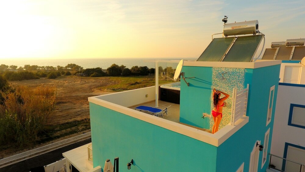 Фото Seabreeze Villa - with Jacuzzi & heated pool