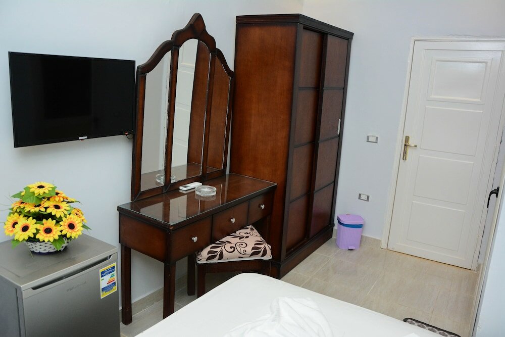 Фото Victory Of Downtown Hotel