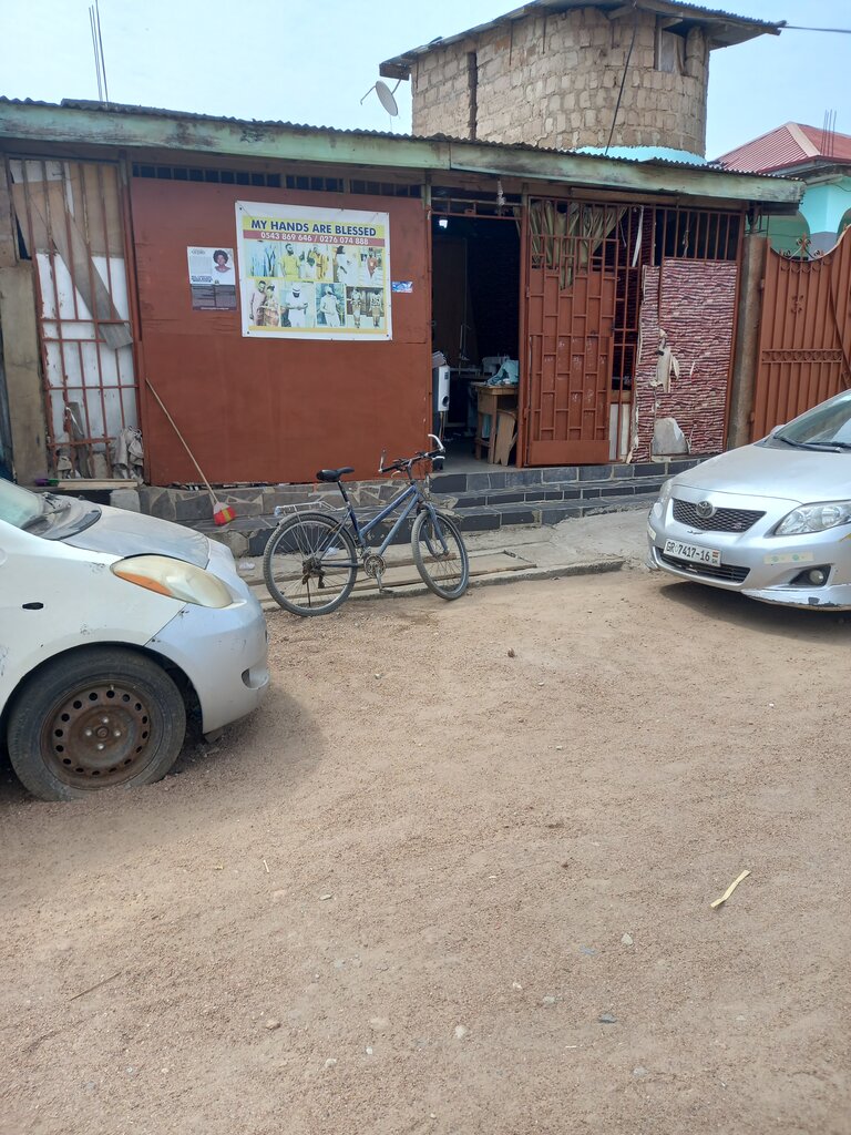 Tailor My hands are blessed, Accra, photo