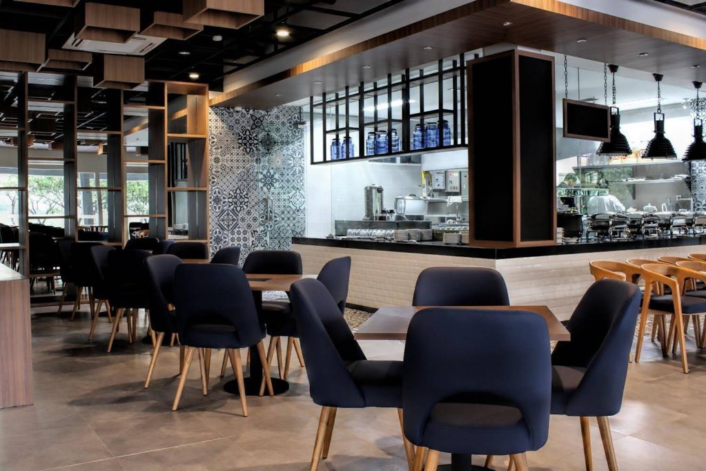 Фото Opi Indah Hotel