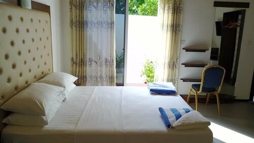 Гостевой дом Thoddoo Inn на Тодду