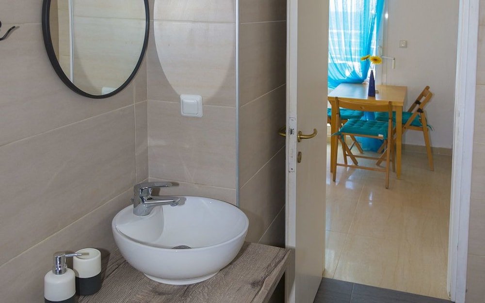 Фото Salonikiou Beach Deluxe Apartments