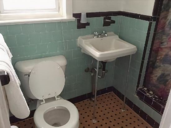 Фото New Sea Breeze Motel