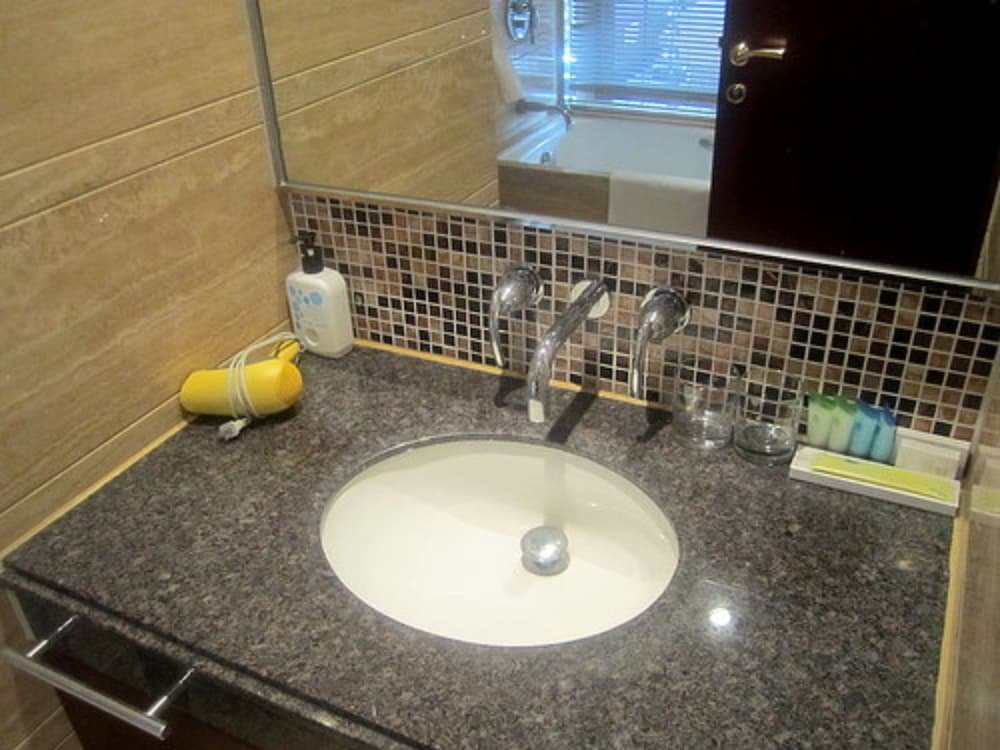 Фото Jing'an Ziyuan Apartment Hotel