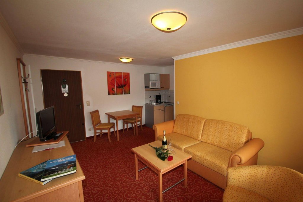 Фото Alpenhotel Garni Weiherbach