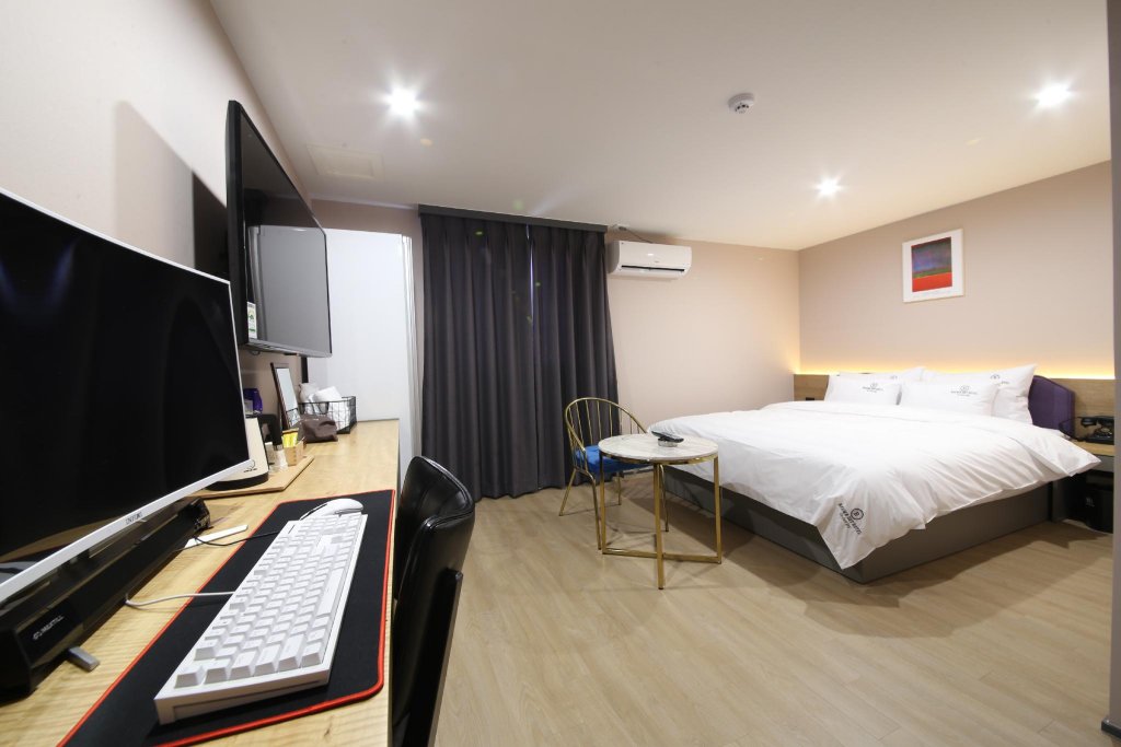 Фото Brown Dot Hotel Minam