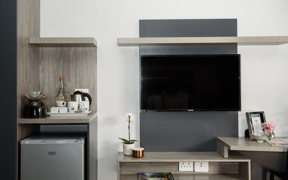 Фото Enigma Hotel Apartments