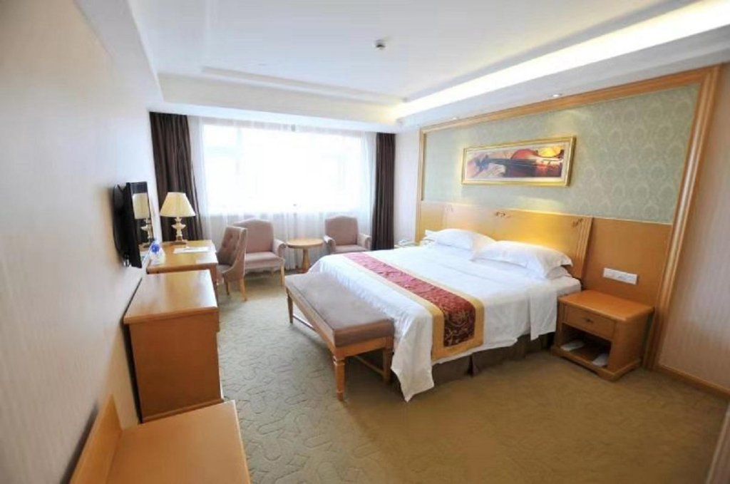 Фото Vienna Hotel Jiangsu Qidong Park South Road branch