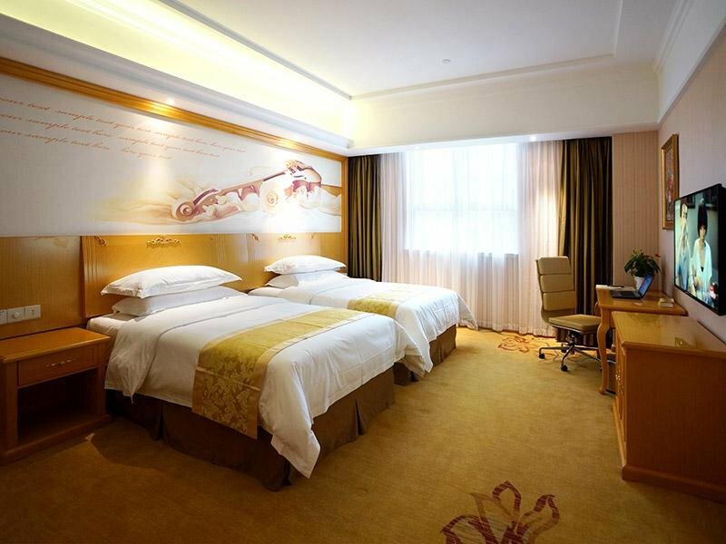 Гостиница Vienna Hotel Shanghai Hongqiao Huaxin Road в Шанхае