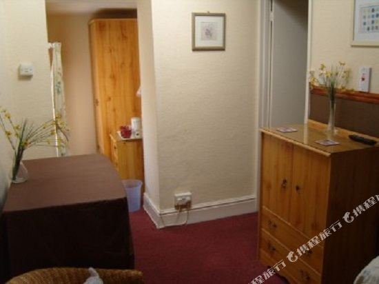 Фото Holly Lodge Guest House