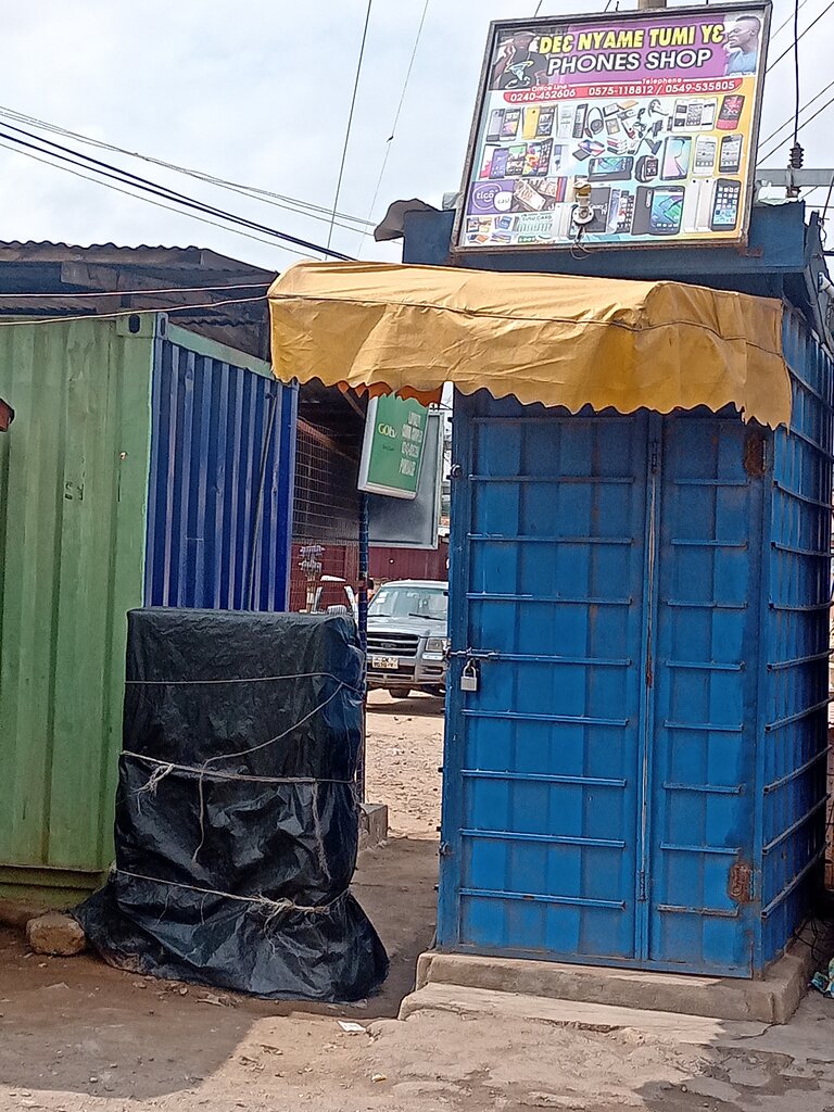 Mobile phone store Dee nyame tumi ye, Earth, photo