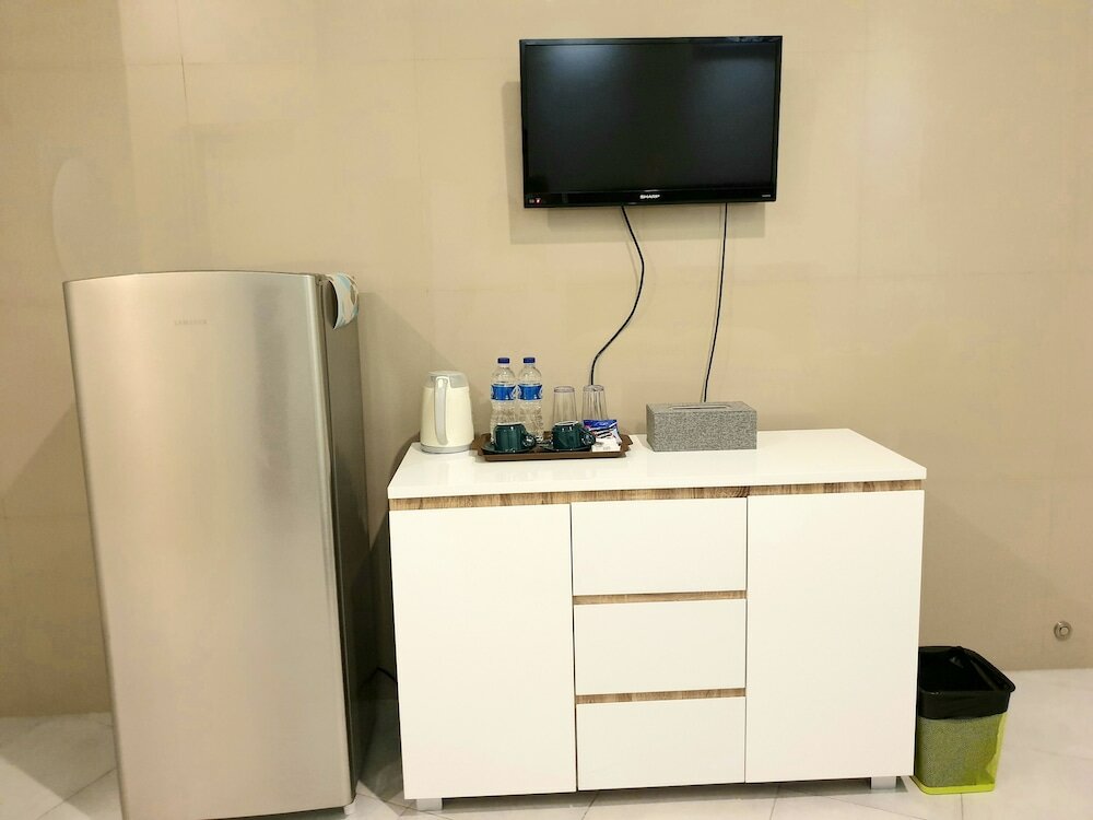 Фото Comfy Room in Piliau Residence