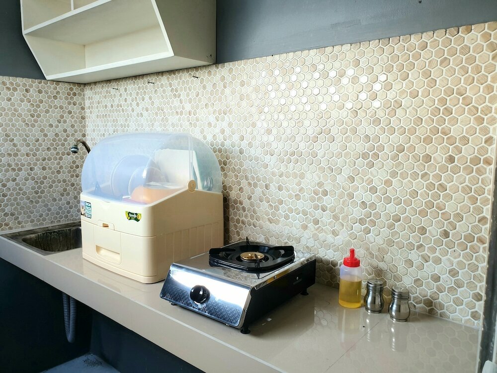 Фото Comfy Room in Piliau Residence