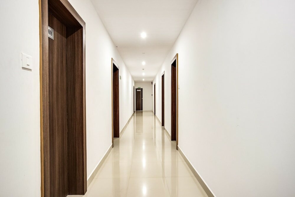 Фото Capital O 60558 Hotel Midhuna International