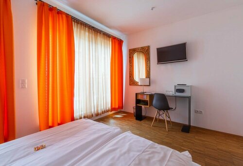 Гостиница Hotel Freischütz Apartments в Ландсхуте