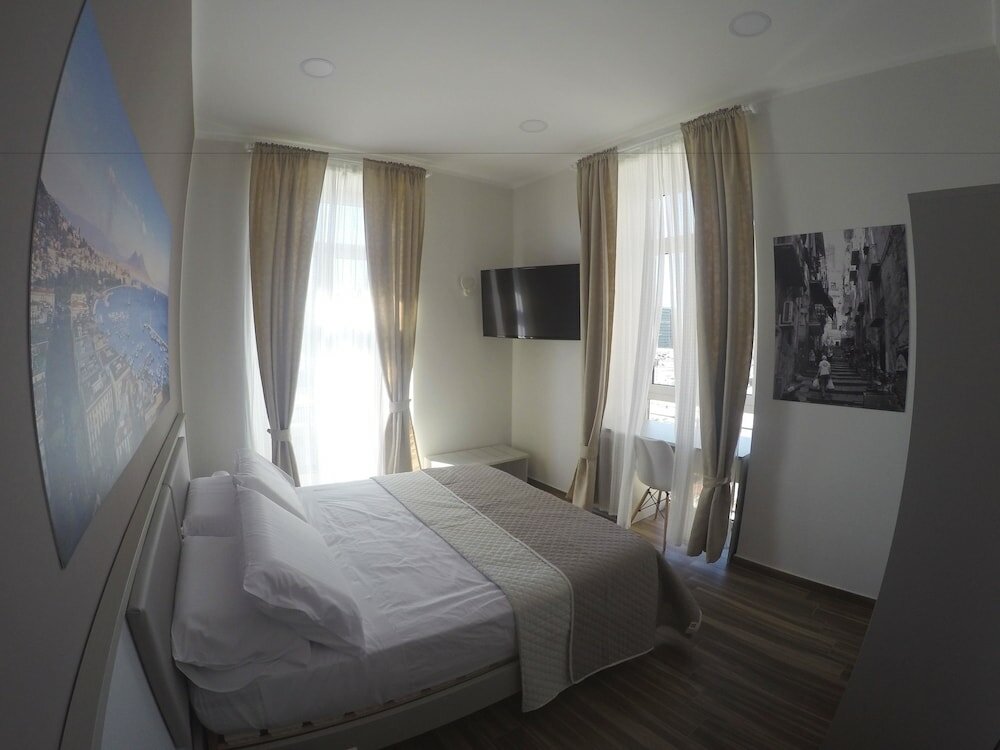 Фото Rooms Stazione Centrale