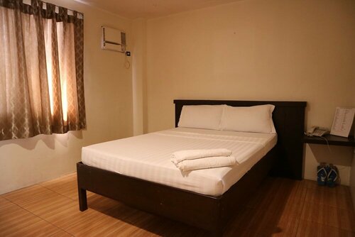 Гостиница Casa Palmera Tourist Inn в Сан-Пабло