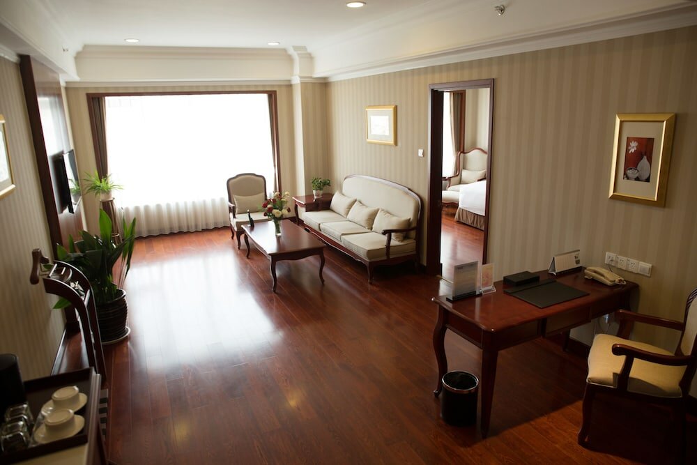 Фото Enrichee Gloria Plaza Hotel Qingdao