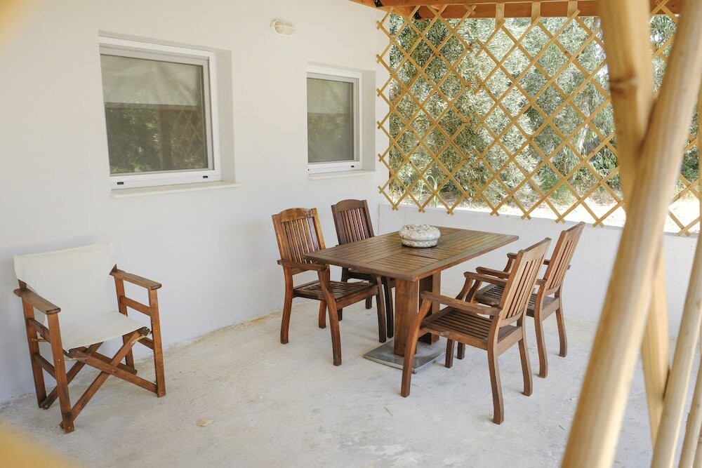 Фото House of Paradise in front of the golf court-sea