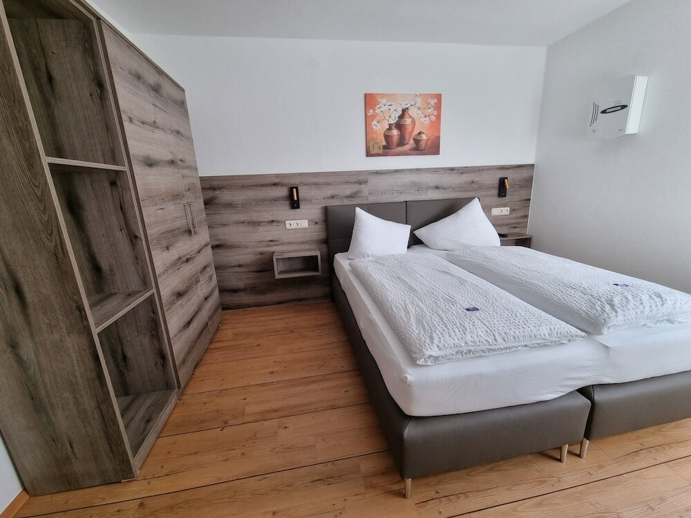 Фото Ferienwohnungen am Buchbrunnen