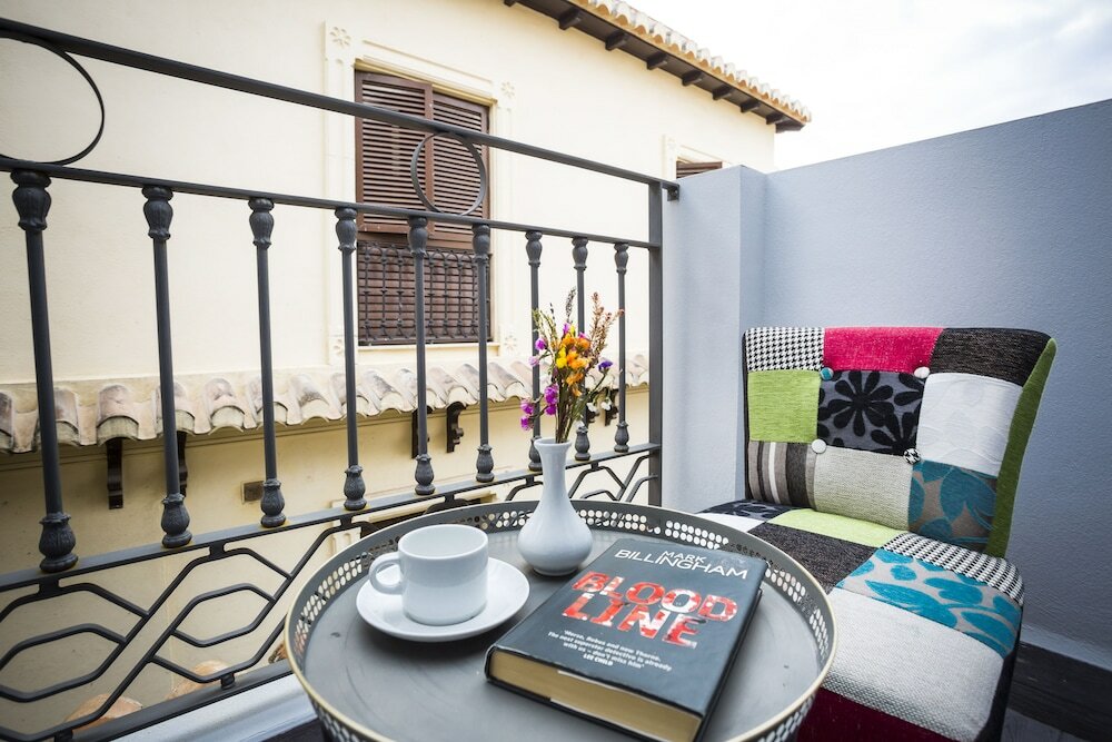 Фото La Casa de La Trinidad Hotel