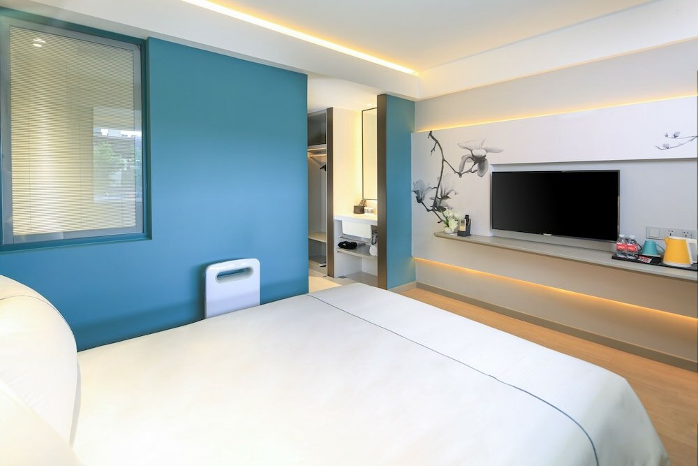 Фото Magnotel Hotel of Shanghai Jinjiang Park