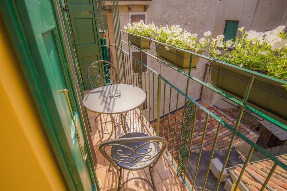 Фото Corte Realdi Boutique Rooms Garda