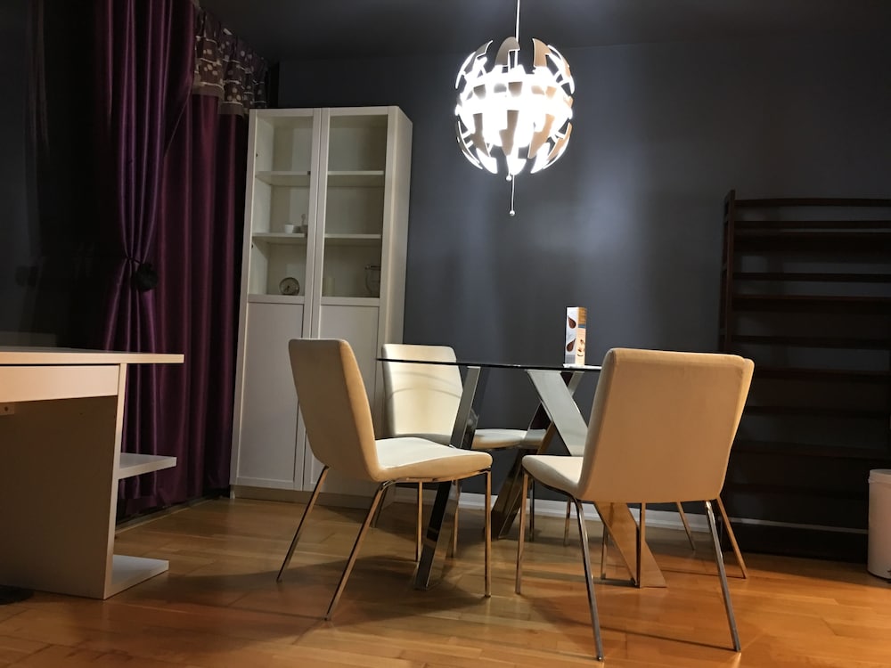 Фото Altitude Suites Bay Street by Teristo Group