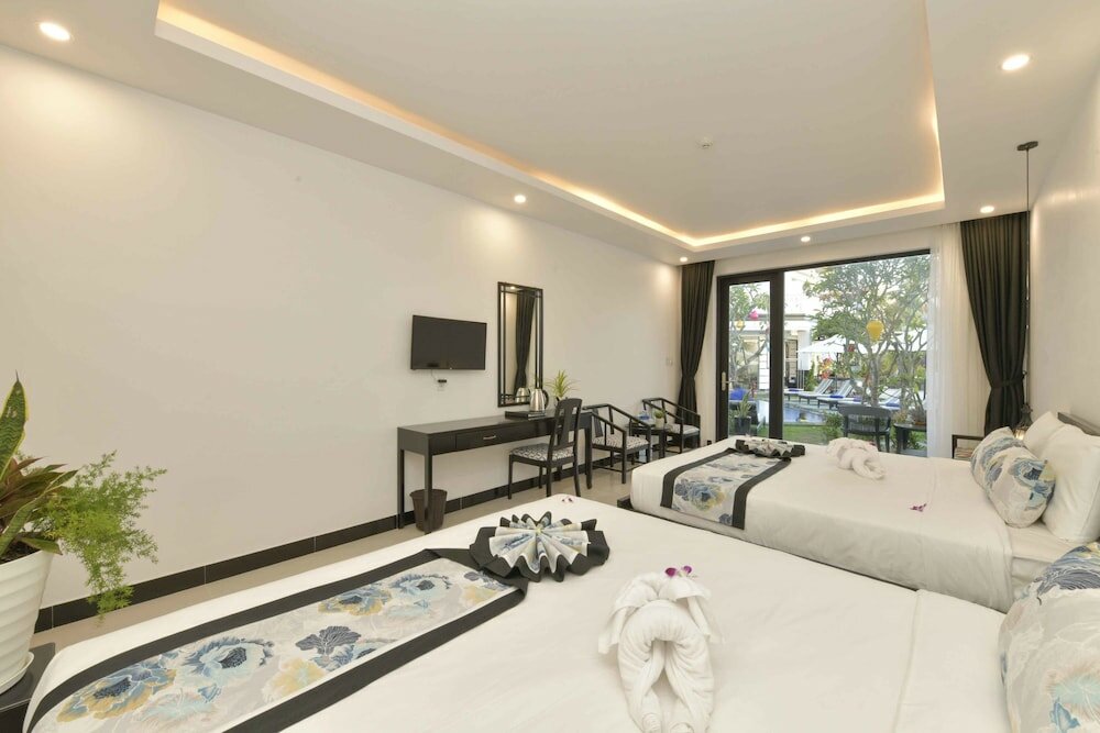 Фото Gem Riverside Hotel Hoi An