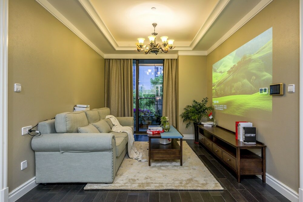 Фото Shanghai Xinchuan Boutique Apartment