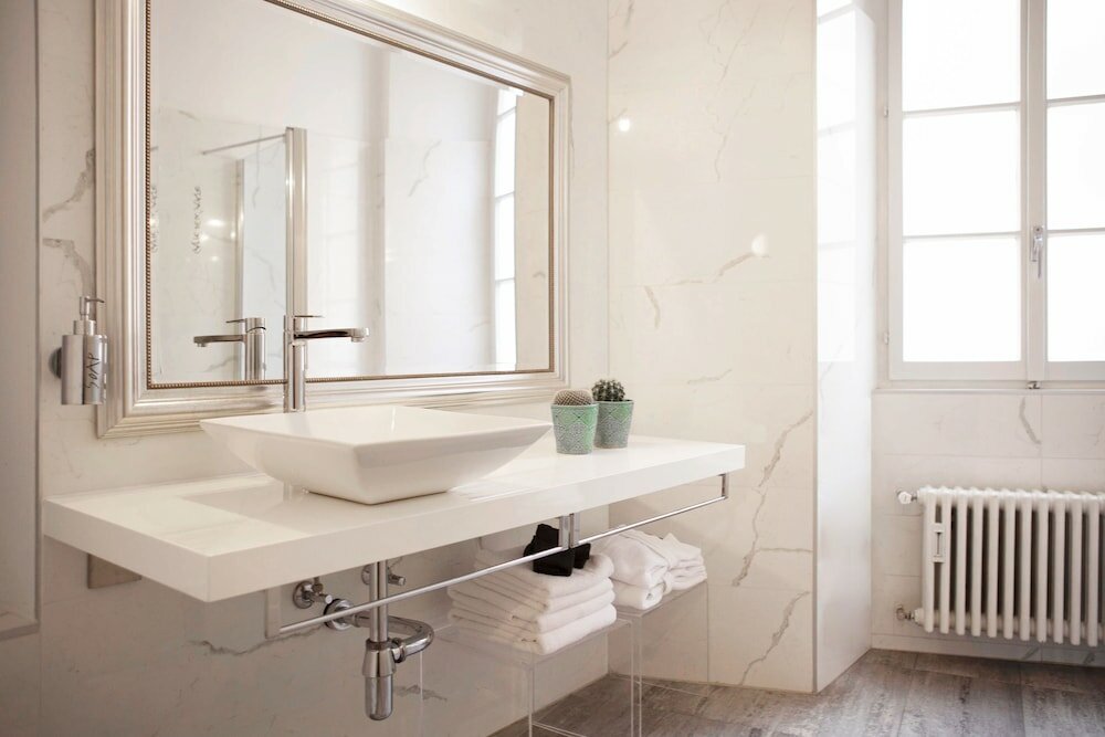 Фото Caffè dell'Arte Boutique Rooms