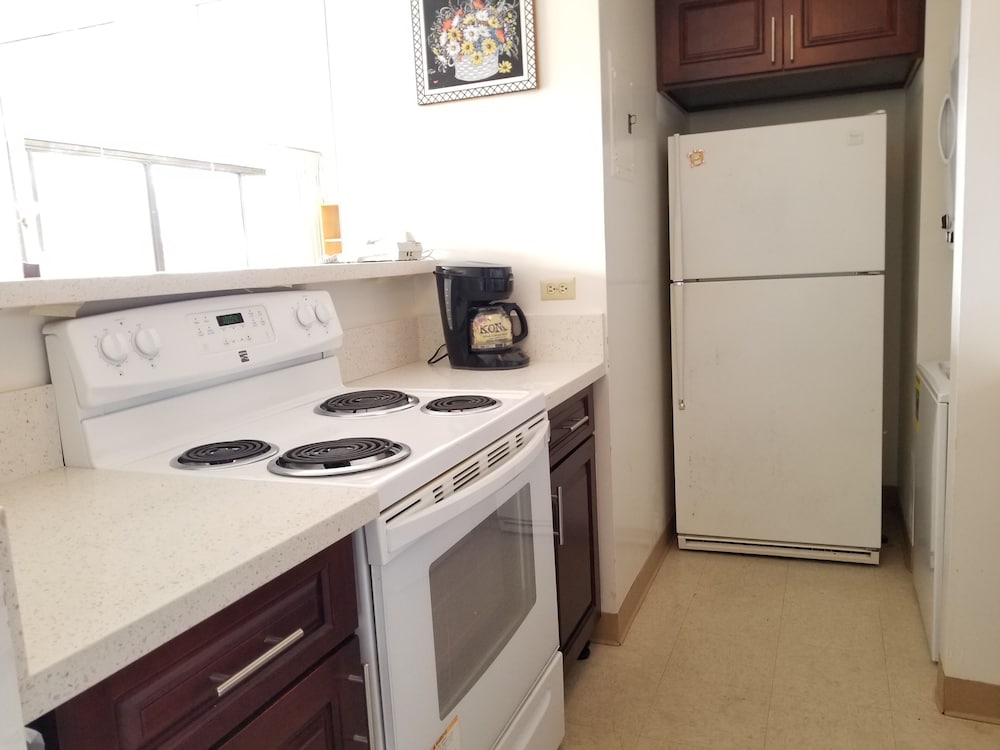 Фото Spacious Condos With Private Balcony at Discovery Bay - Free Wifi, Near Beaches!