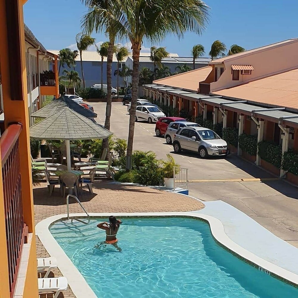 Фото Aruba Quality Apartments & Suites