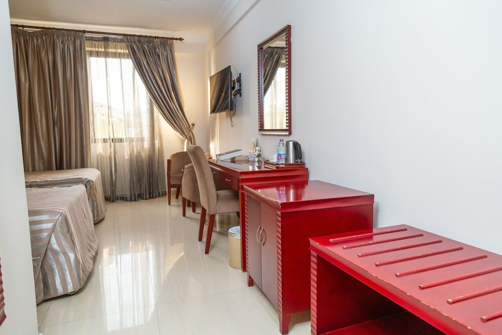 Фото Sunlodge Hotel