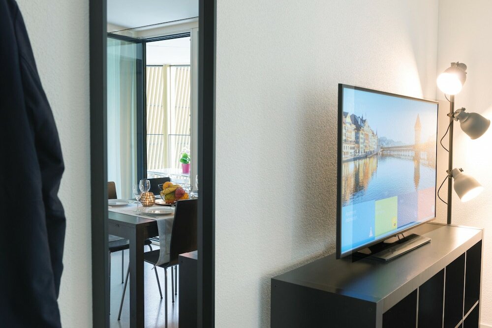 Фото Hitrental Allmend Comfort Apartments