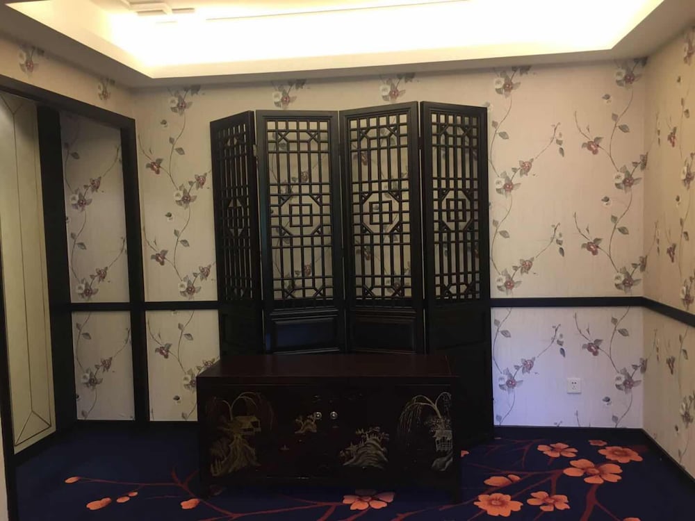 Фото Qiao Garden Vacation Hotel