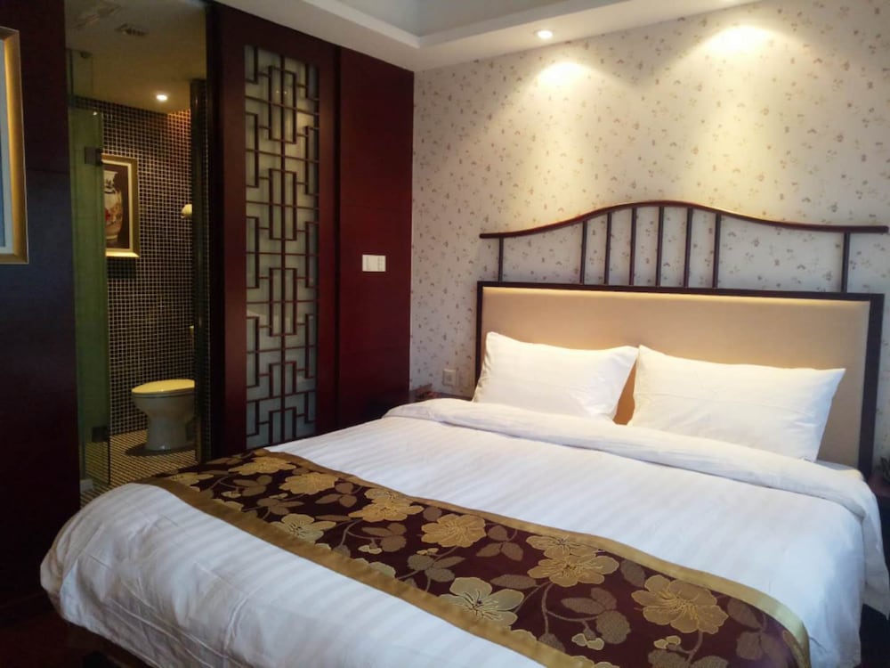 Фото Qiao Garden Vacation Hotel