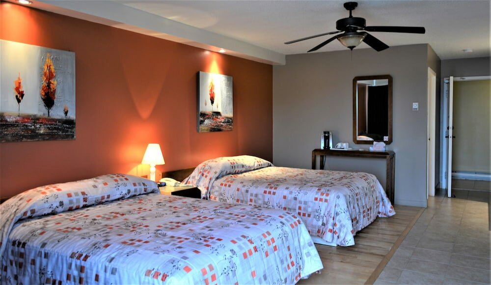 Фото Motel Quatre Saisons