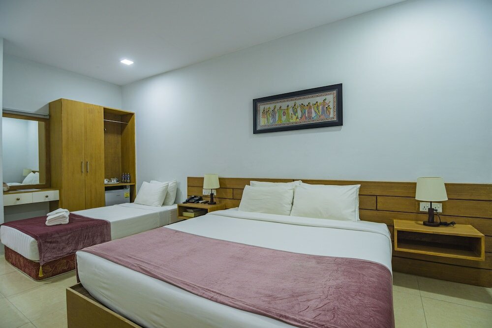 Фото Agga@9mile Hotel