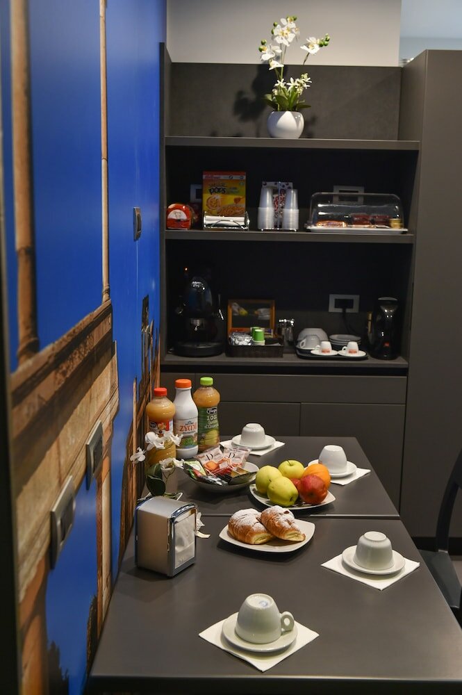 Фото Pompei Inn Ruins Luxury Suites