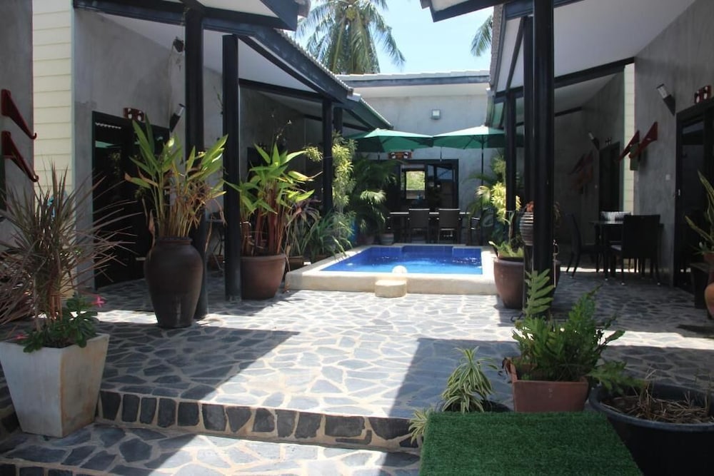 Фото The Beach House Bungalows