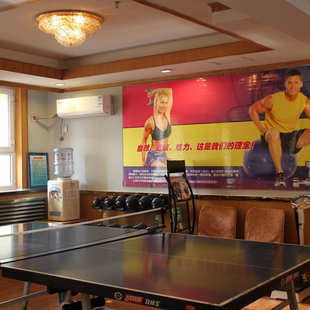 Фото Urumqi Taxinan Hotel