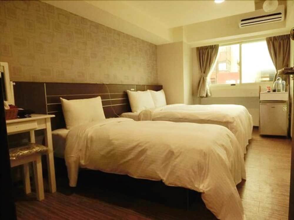 Фото Jhong-Sing Hotel