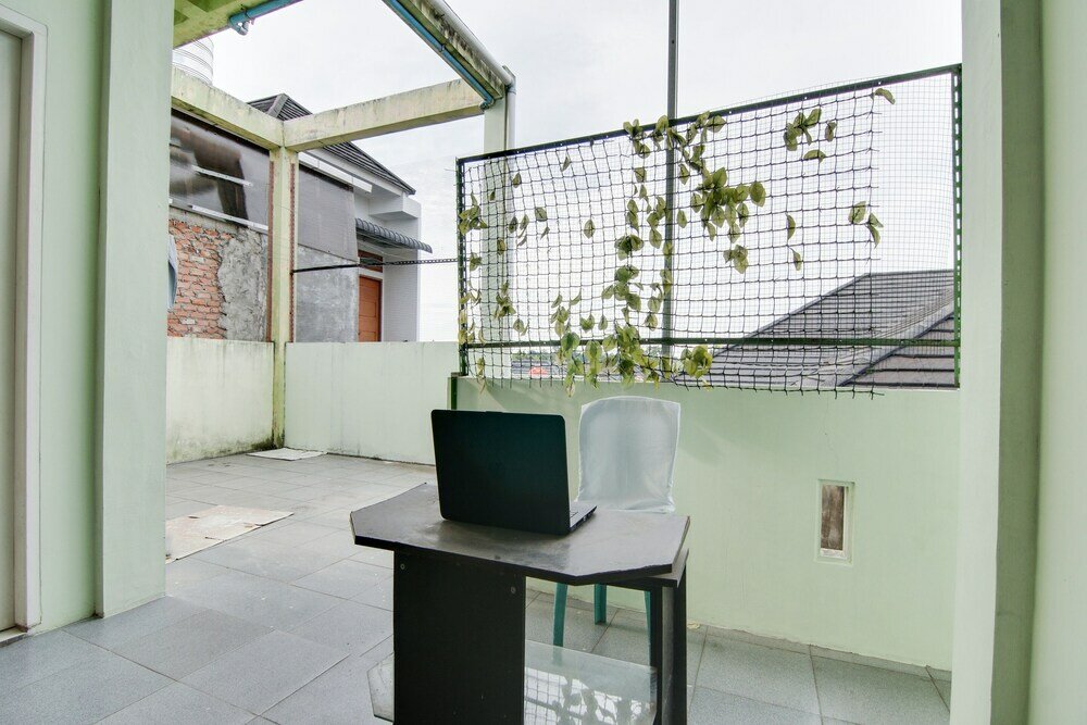 Фото Spot On 91858 Raja Homestay Syariah