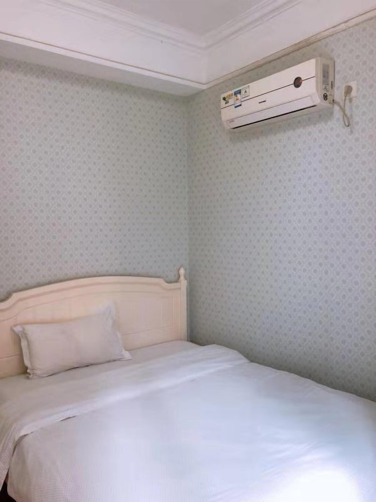 Фото Sixiangjia Apartment