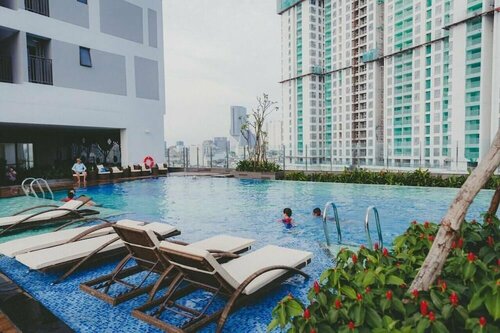 Апартаменты Tri's Inn - Unique Rivergate Residence Apartment в Хошимине