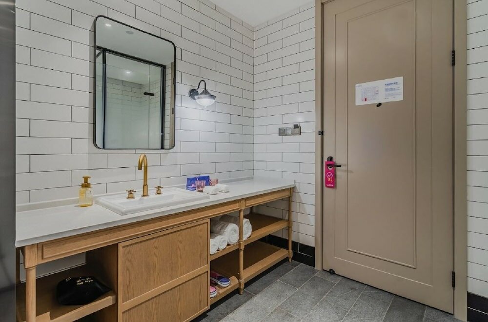 Фото Manxin Hotel Qingdao Zhanqiao