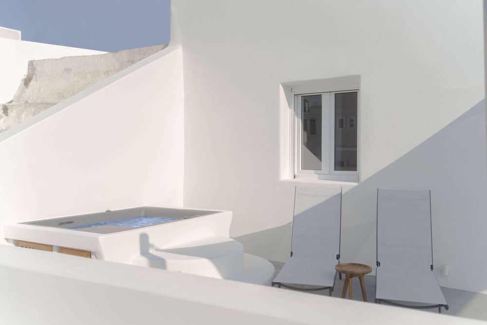 Фото Thallos Cave House and Apartments